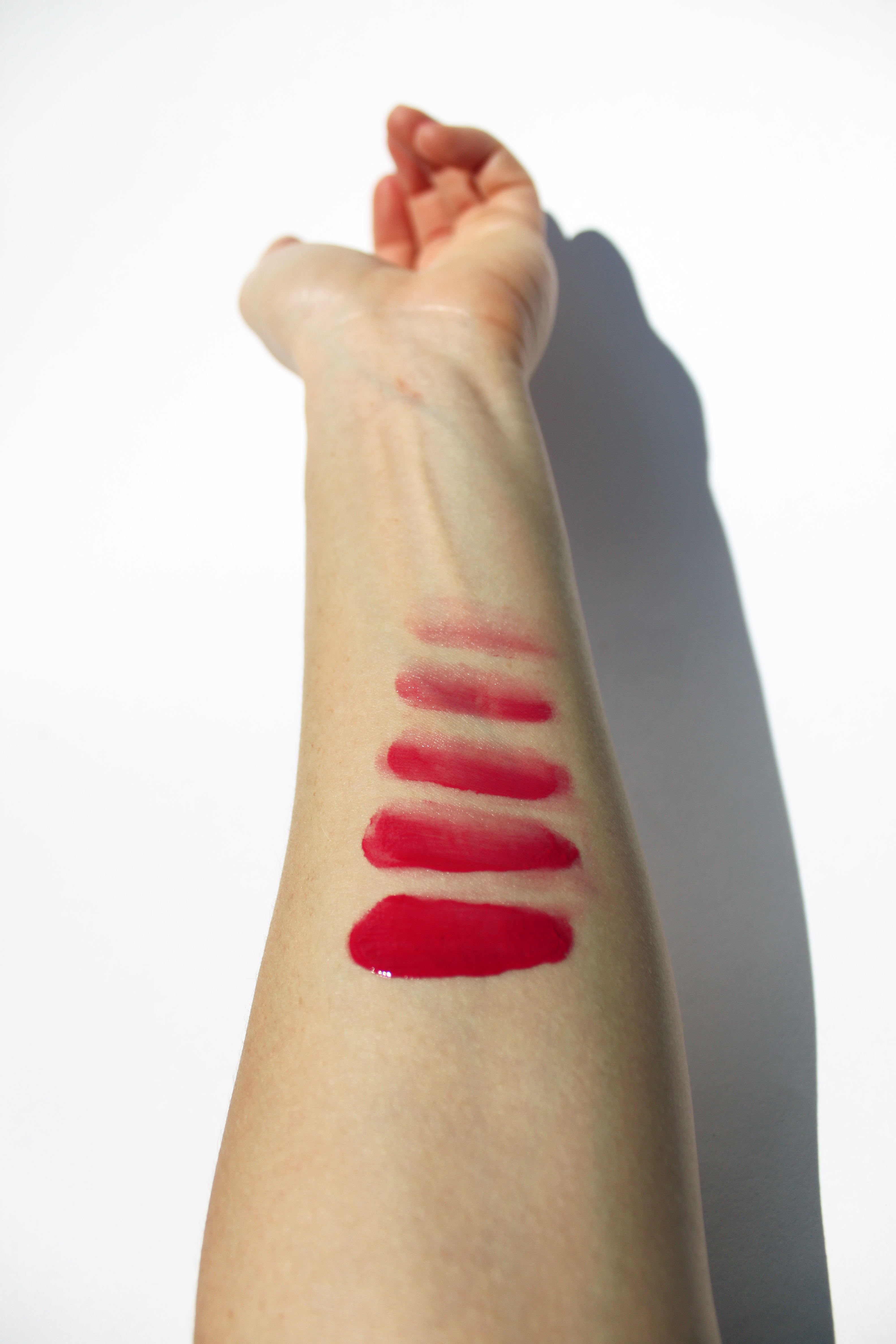 Naked Truth Beauty lip and cheek lipstick in Wednesdays, the red lipstick guide.